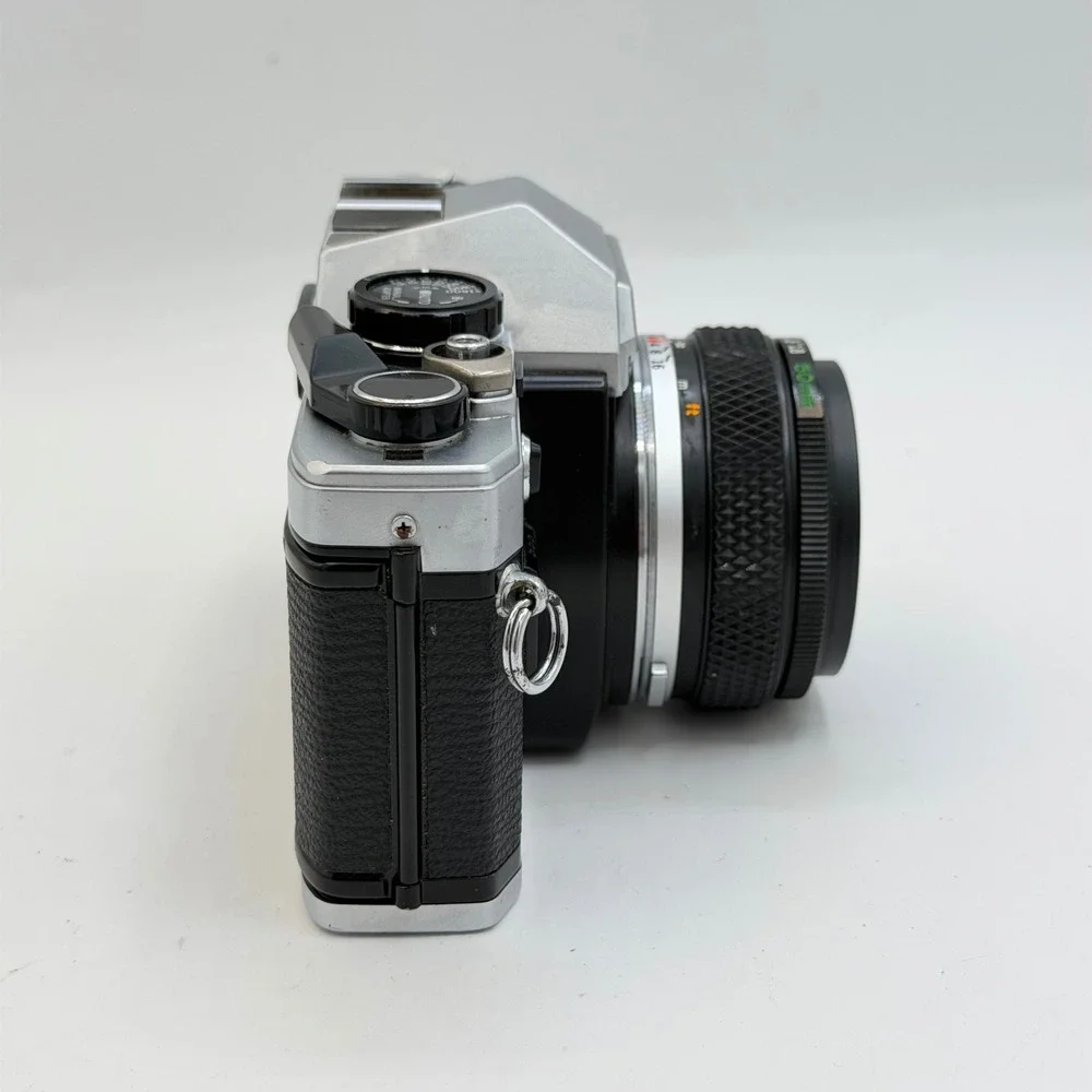 Olympus OM10 35mm Film SLR Camera with Zuiko Auto-S 50mm f1.8 Lens Silver Black